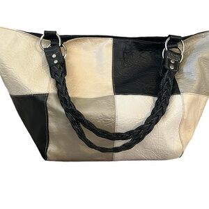 Black, cream, and beige patch work leather handbag